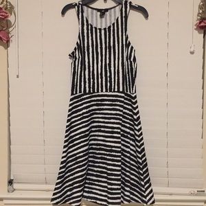 Black and white striped dress.